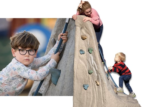 image of children climbing up small playground rocks