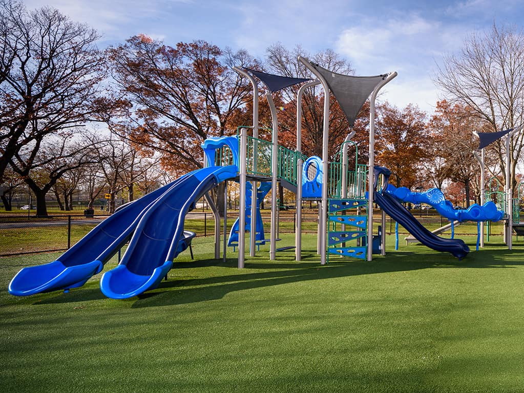 image of a park with a blue side during the fall