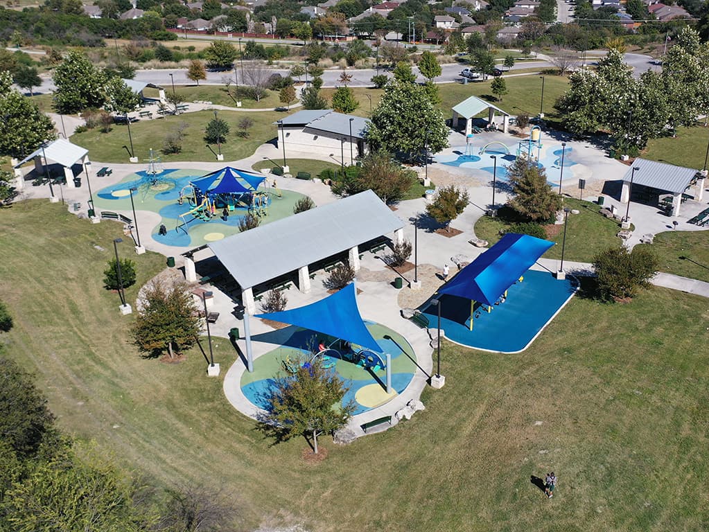 aerial shot of large blue colored themed park