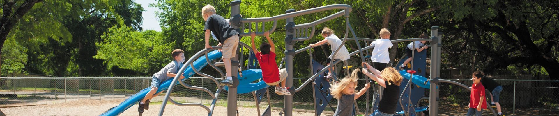 children playing on gray climbing ropes at park