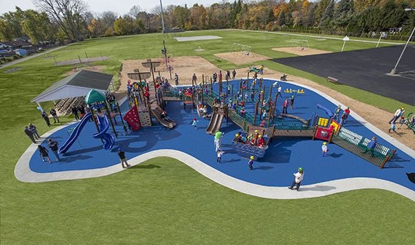 Aerial view of Shipyard style playground with blue turf