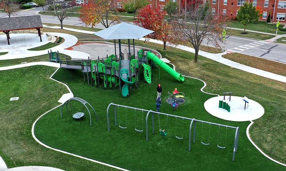 Aerial view if Indian Creek Library Playground on green turf