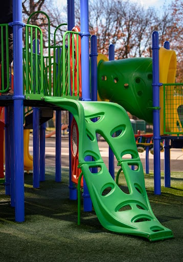 green climbing wall at playground